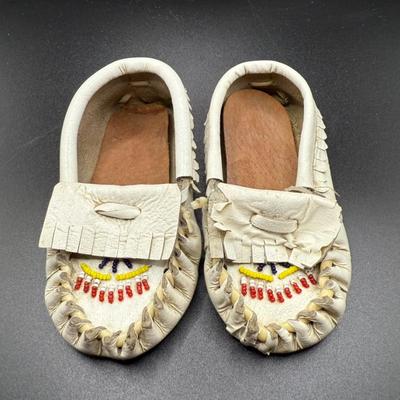 Vintage Beaded White Leather Children's Moccasins
Lot #: 69