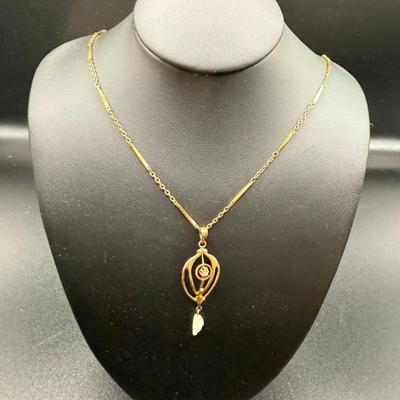 Vintage 10K Yellow Gold Lavalier Pendant W/Freshwater Pearl & White Sapphire On Gold Filled Chain- 1.12 Grams
Lot #: 4