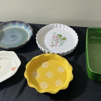 A Collection Of Assorted Dishes And Containers 