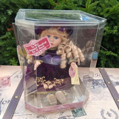 Sale Photo Thumbnail #18: Musical Porcelain Doll "Tiffany" Moves with the music