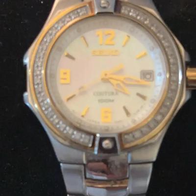 Sale Photo Thumbnail #80: Seiko Coutura With Mother of Pearl Dial