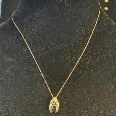 Sale Photo Thumbnail #124: 14Kt.  Yellow Gold Pendant & Chain with Dark Blue Gemstone