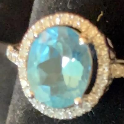 Sale Photo Thumbnail #107: 14Kt. White Gold Halo Ring w/ Blue Topaz and Diamonds