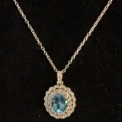 Sale Photo Thumbnail #125: Sterling Silver Chain with Large Blue Gemstone