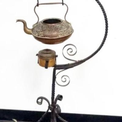 Sale Photo Thumbnail #226: 1217	ASIAN TEA POT AND WARMER ON A WROUGHT IRON STAND, TEA POT MISSING LID, APPROXIMATELY 48 IN H
