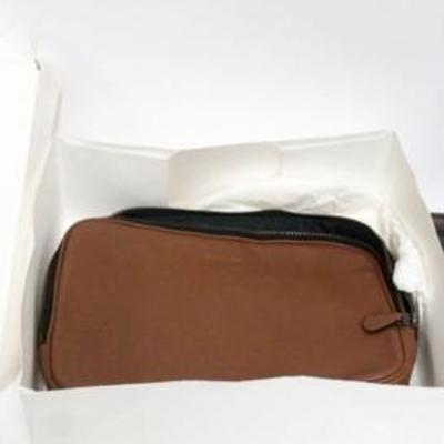 Sale Photo Thumbnail #150: 1142	2 COACH PURSES, BROWN LEATHER MF POUCH NEW WITH TAGS AND BROWN LEATHER CLUTCH USED WITH WEAR
