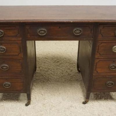 Sale Photo Thumbnail #240: 1231	ANTIQUE MAHOGANY KNEE HOLE DESK WITH REEDED FRONT LEGS, APPROXIMATELY 48 IN X 23 IN X 30 IN H
