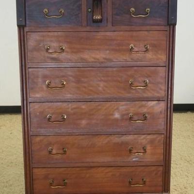 Sale Photo Thumbnail #230: 1221	UNUSUAL ANTIQUE FLAME MAHOGANY 7 DRAWER CHEST WITH BRASS GALLERY TOP AND CENTER DOOR, APPROXIMATELY 33 IN X 19 IN X 63 IN H
