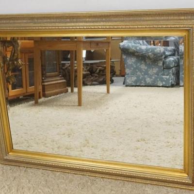 Sale Photo Thumbnail #228: 1219	BEVELED EDGE MIRROR IN GILT FINISH FRAME, APPROXIMATELY 44 IN X 32 IN
