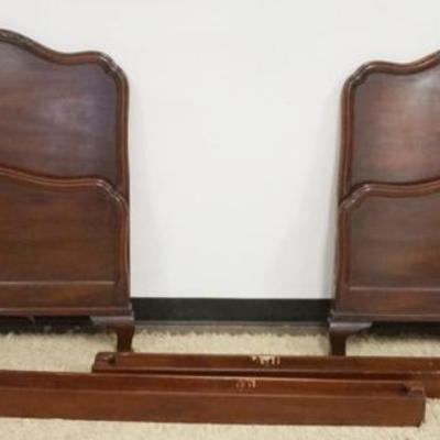 Sale Photo Thumbnail #232: 1223	PAIR OF KINDEL MAHOGANY SINGLE BEDS WITH SHELL CARVED CRESTS, EACH APPROXIMATELY 39 IN X 42 IN H X 80 IN L
