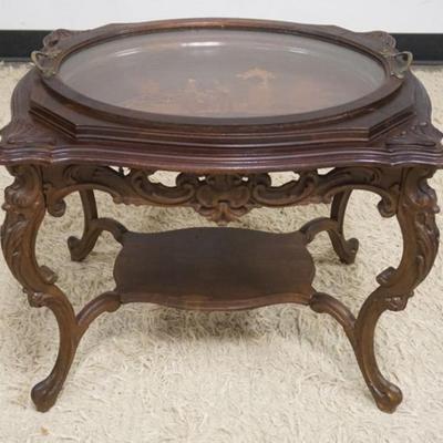 Sale Photo Thumbnail #250: 1241	CARVED WALNUT SERVING TABLE WITH INLAID TOP AND REMOVABLE SERVING TRAY, APPROXIMATELY 25 IN X 19 IN X 21 IN H

