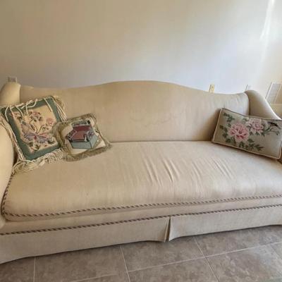 Cream Upholstered Sofa & Matching Round Skirted Ottoman