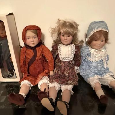Set of Four Vintage Porcelain & Cloth Dolls