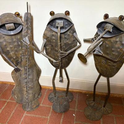 Trio Of Whimsical Metal Frogs Playing Musical Instruments 