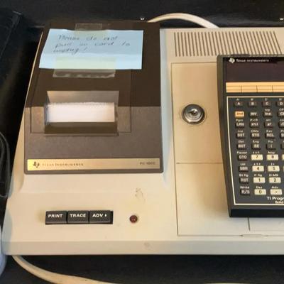 Texas Instruments TI-59 Programmable Calculator With A PC-100 Printer Cradle 