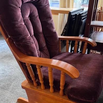 Glider Rocker With Aubergine Color Cushion