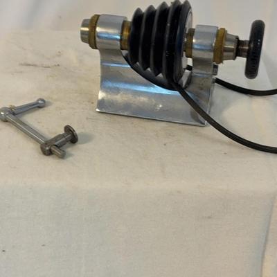 The item shown is an antique watchmaker's lathe tailstock