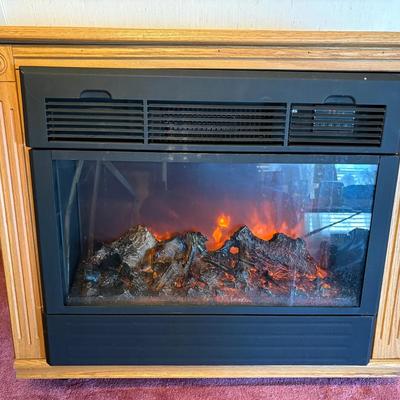 Portable Electric Fireplace Heat Surge Roll-N-Glow 