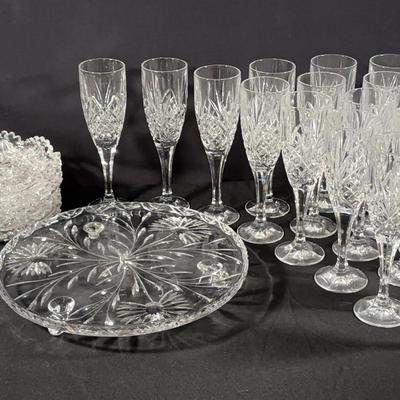 Crystal Champagne Flutes (22) with large cake plate and (4) + (2) small serving plates