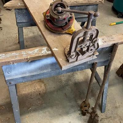 Pipe vice and set of 3 pipe threading dies. Pair Of Folding Saw Horses 