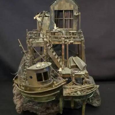 Ko209 metal dock on lava rock art