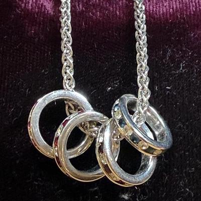 Sterling necklace with four rhinestone silver charms