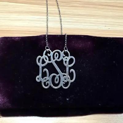 Sterling monogram necklace with cursive script design