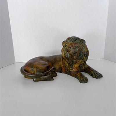 Cast Metal Recumbent Lion Figurine.jpg