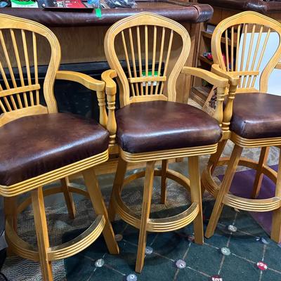 Three Swivel Bar Stools