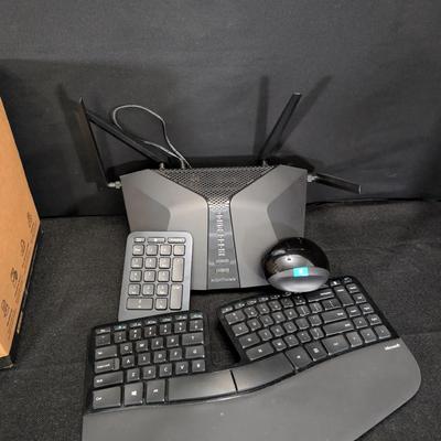 Sculpt Ergonomic keyboard and Sculpt wireless mouse w/ number pad & Nighthawk gaming router. 