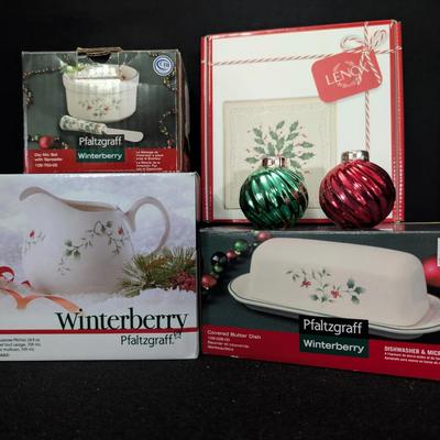 Three Pfaltzgraff Winterberry pieces, two glass Christmas Tree Ornaments, and a Lenox Trivet.