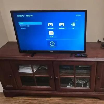 Phillips Roku 32 in TV With TV Stand-Upstairs