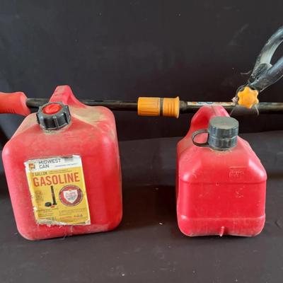 Homelite Weed Eater & 2 Gas Cantainers