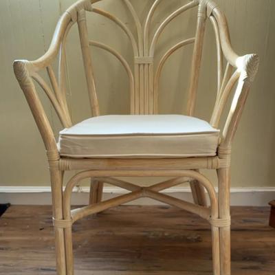 White-Washed Rattan Armchair With A White Cushion. 