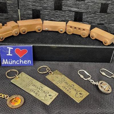 Variety of Collectibles (Wooden Train, Planters Canned Wizzler, Horse Figurine, Key Chains)