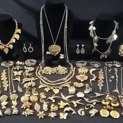 Gold Tone Jewelry Featuring A Gruen Watch