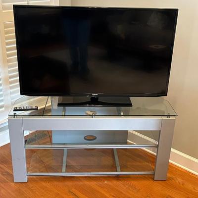 Flat Screen Television and TV Entertainment Stand 