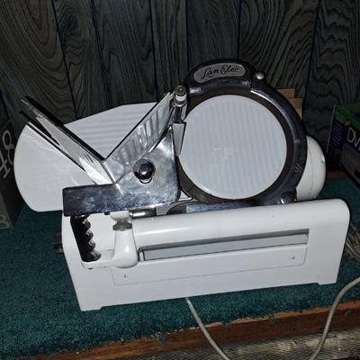 Sale Photo Thumbnail #146: Vintage working meat slicker