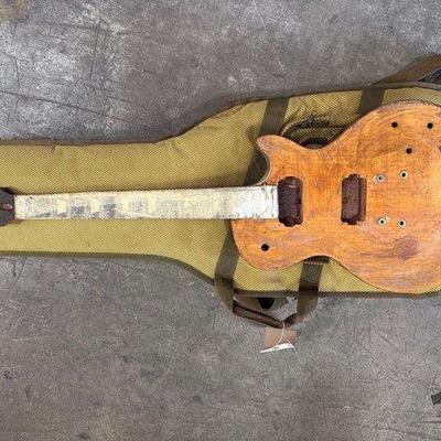2026 • wooden guitar body and bag