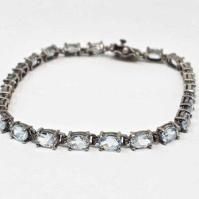 524 • sterling silver with topaz bracelet. 10.3g