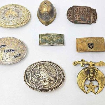750 • (8) belt buckles