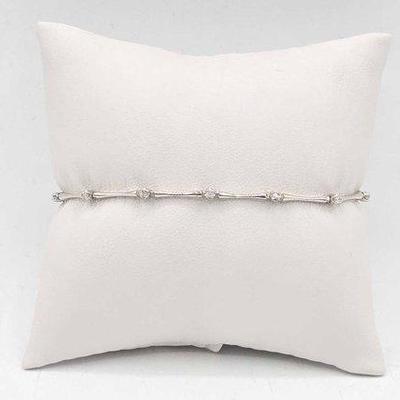 240 • 14k gold and diamond bracelet, 7.5g