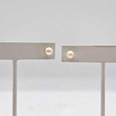 314 • (2) 14k gold pearl earrings, 2.5g