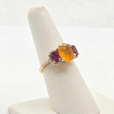 394 • 10k gold ring with diamonds & semi precious stones, 3.8g