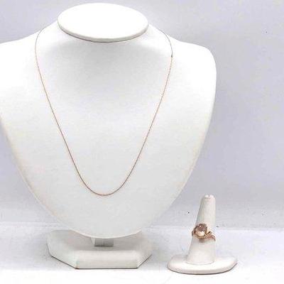 400 • 10k gold ring & chain, 3.6g