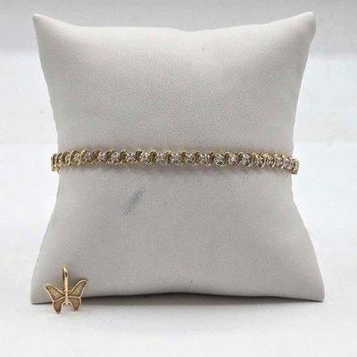 238 • 14k gold & diamond bracelet and butterfly charm, 7.6g