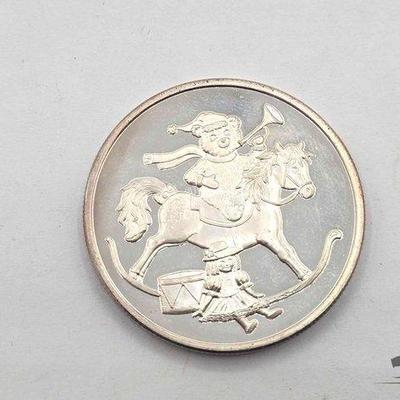 654 • 1999 seasons greetings .999 coin