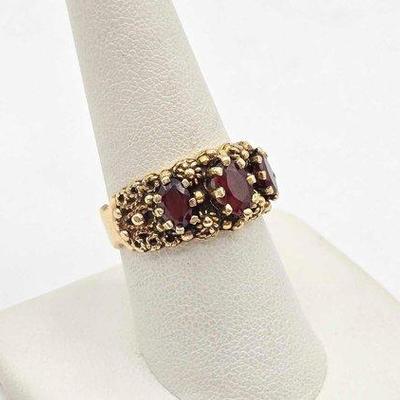 242 • 14k gold ring with semi precious stones, 7.3g