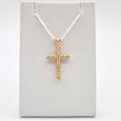 310 • 14k gold and diamond pendant, 2.7g