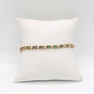 382 • 10k gold and emerald bracelet, 6.8g